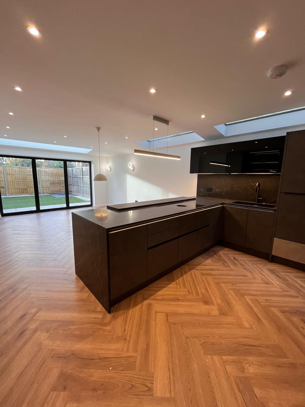 Open-plan kitchen extension with bifold doors built by A&N Building