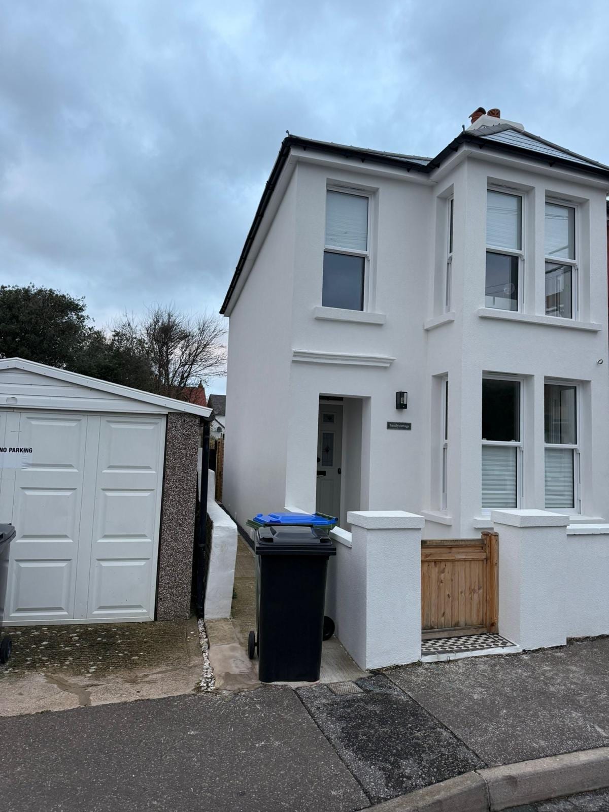 Detached house finished in white smooth render